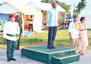 President David Granger along with Minister of Indigenous Peoples Affairs Sydney Allicock and Minister within the Ministry of Indigenous Peoples Affairs Valerie Garrido-Lowe taking the salute at the launch of Indigenous Heritage Month 