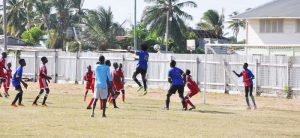 BA Paradise SC’s Tishawn Gordon (#10) about to head the ball past BV’s goalie Shawn Cudjoe but the goal was disallowed.