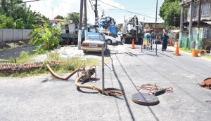 GWI workers at the scene (water pump in foreground pumping into Sussex Street canal) 