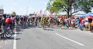 Jamal John (2nd right) and Raul Leal (right) commence the battle after being sent on their way by Digicel Head of Marketing Jacqueline James on Sunday last.