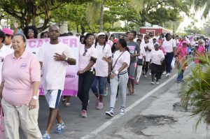 Representatives from the Giving Hope Foundation and other stakeholders march along Church Street.