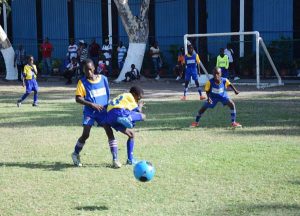 Action in the clash between St. Angela’s and St. Pius yesterday at the Banks DIH ground, Thirst Park.