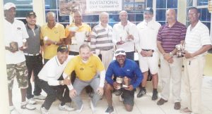 Winners pose with some members of the Macorp executive. From left to right, standing:- Mohanlall Dinanauth; Guillermo Esscarraga of Macorp; Maurice Solomon; ‘Max’ Persaud; Jorge Medina – CEO Macorp; ‘Pur’ Persaud; Angel Amaris of Macorp; Oncar Ramroop – LGC President; and Patrick Prashad – LGC Vice-President. Stooping:- Miguel Oviedo and Jorde Pinol of Macorp, and Balgobin Ragnauth.