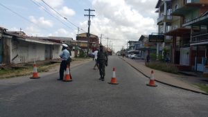 Soldiers and police ranks around the Camp Street prison yesterday 