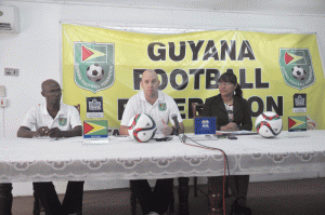 GFF Technical Director Ian Greenwood speaks to the media, while Technical Development officer Lyndon France (left) and Communication and Public Relations Officer Debra Francis listen. 