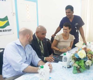 Officials at the launch of the Emergency Nursing Specialty Programme. Standing is Dr Zulfikar Bux and second from left is Minister George Norton in the company of specialists from the Vanderbilt Medical Centre.