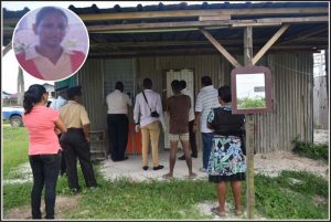 Ranks as they break the padlock on the shack in search of the missing Prospect woman (inset).