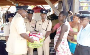 Police ranks hand over some of the items to relatives