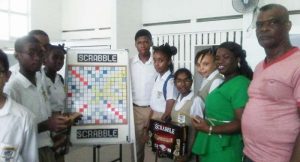 Carlton Murray (right) stands next to Teacher, Liana Stephens and students during the orientation sessions.