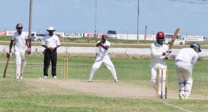 Richardson pulls Randy Lindore during his 121 while David Dick who made 98 and put on 210 for the first wicket with Ovid-Richardson, is at the non striker’s end  at GDF yesterday (Sean Devers photo)