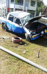 The police vehicle after it crashed into the lamp post.