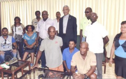 William France differently abled Athletics Club interface with President Granger