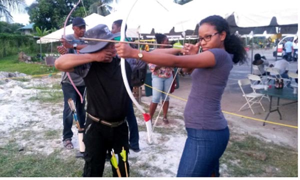 https://www.kaieteurnewsonline.com/images/2017/09/Archery-Guyana-Chairman-Nicholas-Hing-giving-tips-to-one-of-the-many.jpg