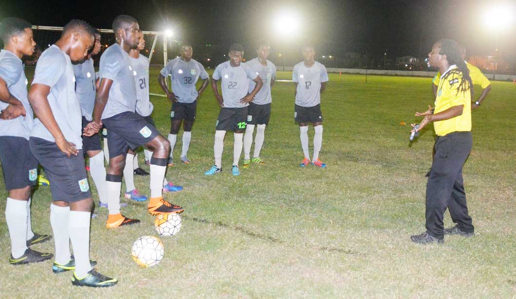 https://www.kaieteurnewsonline.com/images/2017/09/Head-coach-Wayne-Dover-interacting-with-the-squad-during-Wednesday-nights-session-at-GDF.jpg