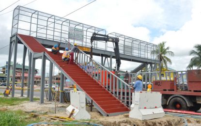 East Bank pedestrian overpasses on schedule for Nov. deadline