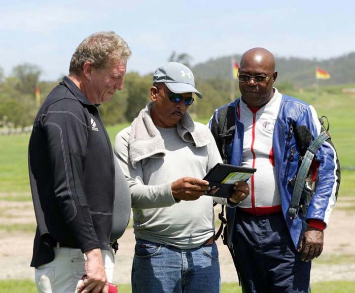 https://www.kaieteurnewsonline.com/images/2017/11/Mahendra-Persaud-and-Lennox-Braithwaite-with-a-colleague-seen-discussing-a-difficult-1000-yds-range-after-a-practice-session-earlier-this-week.jpg