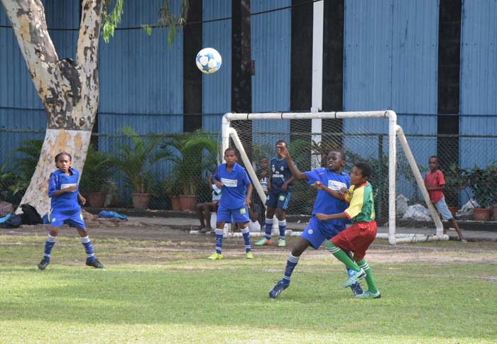 https://www.kaieteurnewsonline.com/images/2017/11/West-Ruimveldts-Ian-Daniels-holding-off-a-defender-as-he-sets-to-receive-a-lobbed-pass.jpg