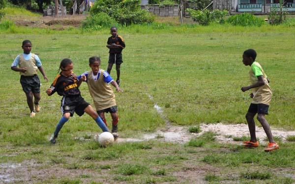 https://www.kaieteurnewsonline.com/images/2017/12/Agricola-Red-Triangle-and-Diamond-United-goals-scorers-Jonathan-Andries-and-Ronaldo-Adams-battling-for-possession-in-midfield-yesterday.jpg