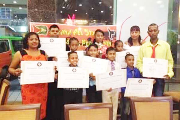 https://www.kaieteurnewsonline.com/images/2017/12/The-Guyana-Mixed-Martial-Arts-Karate-Association-awardees-display-their-awards-at-the-recently-held-event.jpg