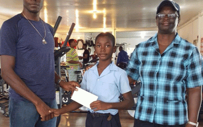 Benjamin helps family member for Caribbean Teachers Union C/ships in Bermuda