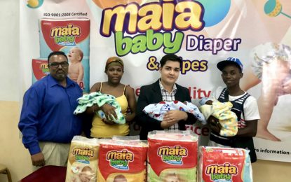 Triplets get one year supply of Maia Diapers