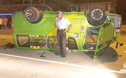 Speeding bus overturns while trailing ambulance