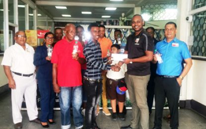 Banks DIH Limited Berbice Branch rewards Flying Ace Cycle Club outstanding riders