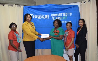 Redeemer, Sophia Primary receive monetary donation from Tropical Shipping.