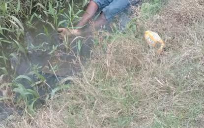 Corpse with plastic bag over head… Neighbour apologizes to dead friend while dumping his body in trench