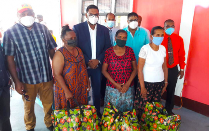 President visits East Canje with relief hampers