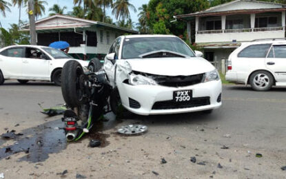 Motorcyclist hospitalised in serious condition after crashing into motorcar