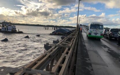 Tug and barge owner pays off debt for damage to Harbour Bridge