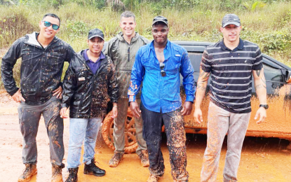 Matthew’s Ridge residents brave rain to collect water filters