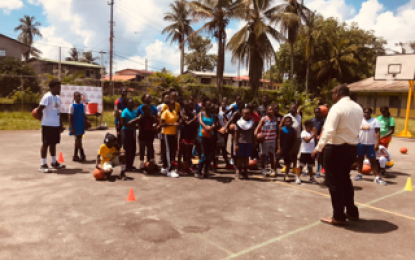 Region 10 Chairman Deron Adams visits Hamid and Joy Basketball Clinic in Linden