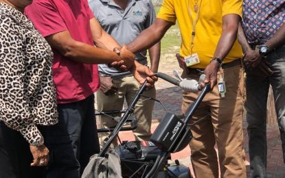 Dr. Haynes Health and Wellness Centre donates Lawn Mowers to Mackenzie Sports Club