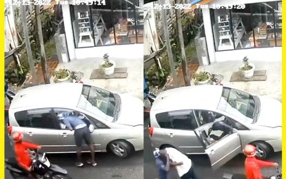 Motorbike bandits pounce on driver seated in car