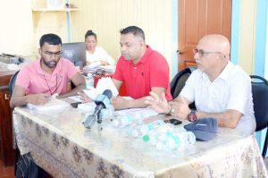 Minister within the Ministry of Public Works, Deodat Indar (centre) at the signing of the road contracts (DPI Photo)