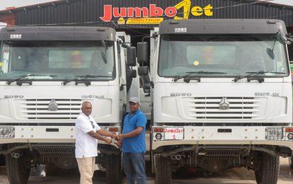 Jumbo Jet hands over brand new Sinotruk heavy-duty dump trucks to Kris Jagdeo Contracting