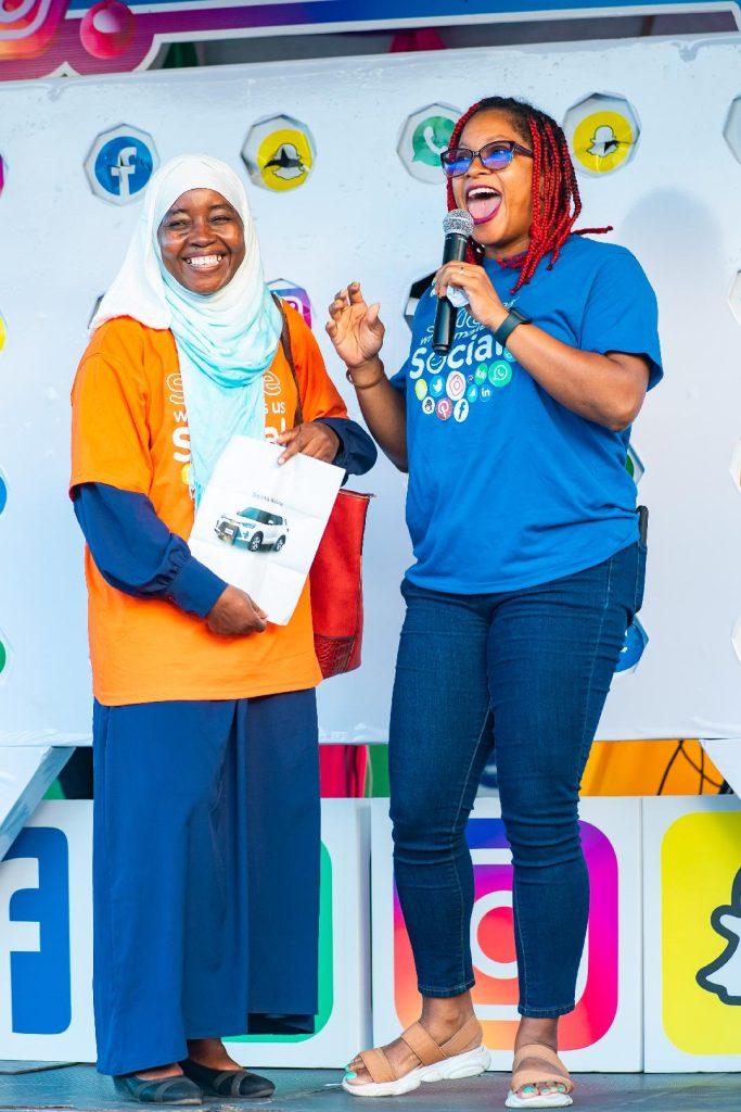 Ackulara Thomas, a winner of a new car is pictured with Senior Public Relations Manager, Jasmin Harris, during the grand draw