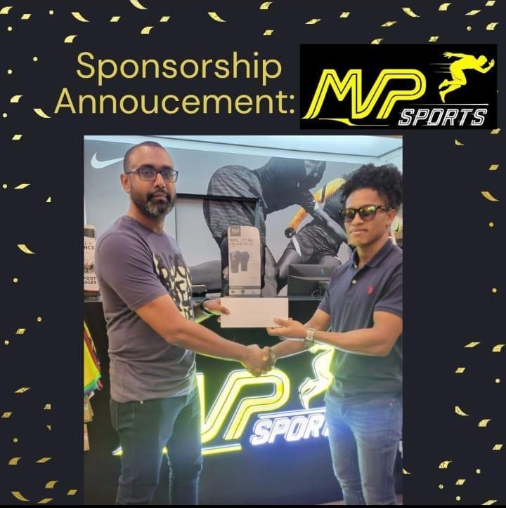 Chief Executive Officer of MVP Sports, Ian Ramdeo (left) hands over the sponsorship agreement to boxer Keevin Allicock.