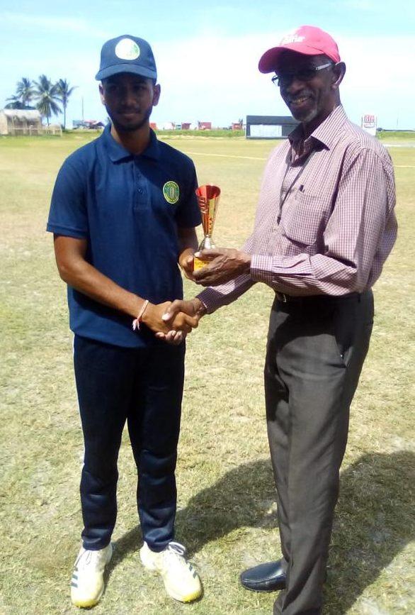 Dave Mohabir receives his Man of the Match award.