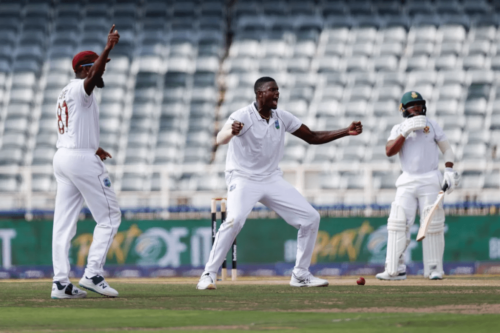 Jason Holder celebrates after trapping Temba Bavuma lbw.  (AFP/Getty Images)