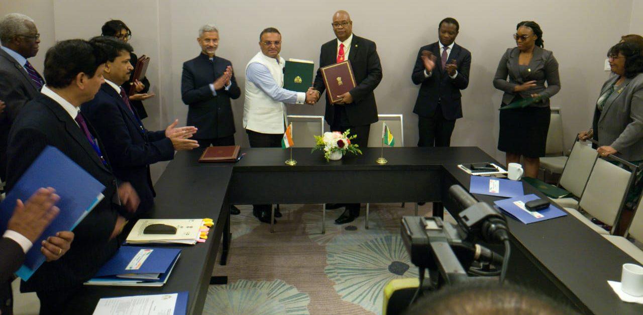 Minister of Public Works Juan Edghill, and the High Commissioner of India to Guyana Dr. K. J. Srinivasa exchange handshakes after the signing of the Air Services Agreement in the presence of India’s Minister of External Affairs Dr. Subrahmanyam Jaishankar; Minister of Foreign Affairs and International Cooperation, Hugh Todd; Permanent Secretary of Ministry of Foreign Affairs and International Cooperation, Ambassador Elizabeth Harper; Director General of the Guyana Civil Aviation Authority, Lt. Col. (ret’d) Egbert Field, and other Technical Officials from India and Guyana. (GCAA photo) 