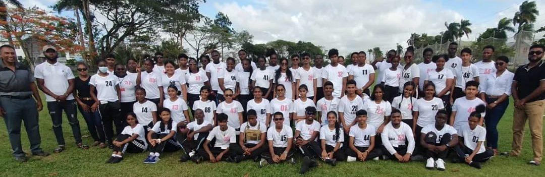 Rosignol Secondary and Freeburg Secondary School students pose with GGA president Aleem Hussain