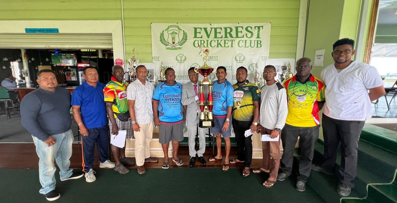 Honourable Speaker of the National Assembly, Manzoor Nadir (centre) poses with the winner’s trophy and representatives of the competing teams and Tournament Director, John Ramsingh (left). 