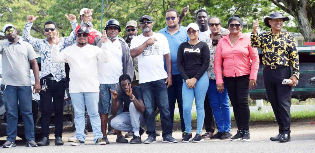 Ray Daggers and team pose for a group photo after completing day six of walk against "barfaced" ExxonMobil Contract