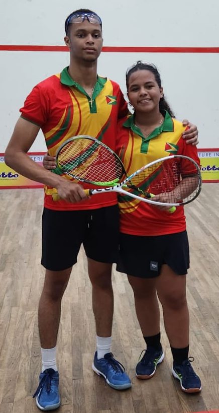 Mixed Doubles champion Nicholas Verwey (left) and Kirsten Gomes in St Vincent.