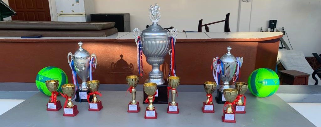 Trophies, medals and other memorabilia for the Nigel Barnes 3-a-side small goal football competition.