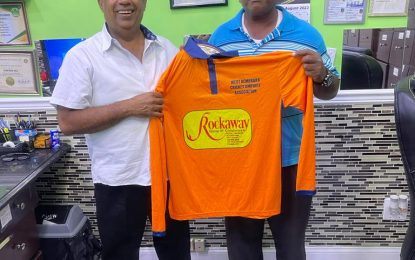 Rockaway Group of Companies presents jerseys to West Demerara Cricket Umpires Association