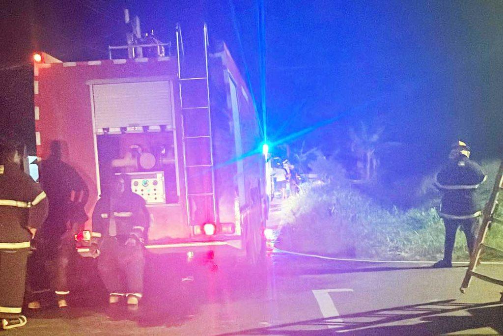 Members of the Guyana Fire Service at the scene of the fire on Saturday night.